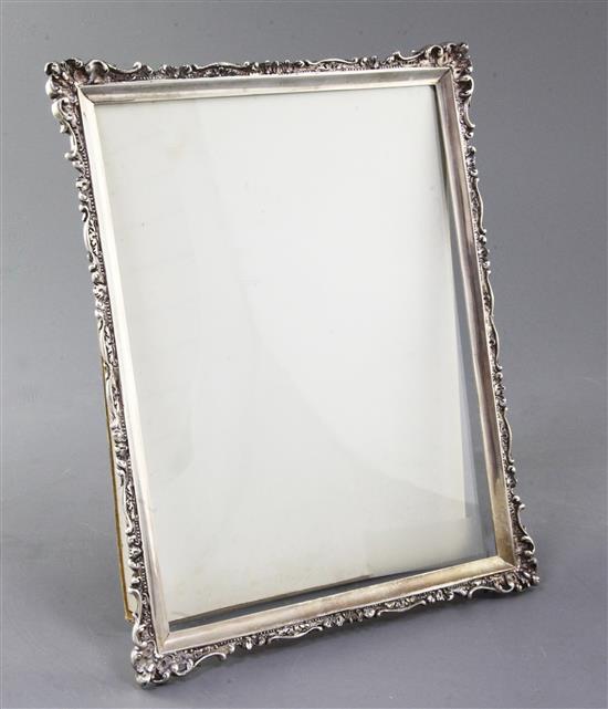 An early 20th century silver mounted photograph frame by Asprey & Co Ltd, London, 1912?, 9.25in.